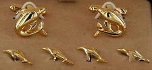 gold tone porpoise dolphin cufflinks and stud set