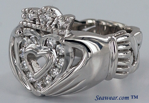 polished hands offering of the Claddagh heart with diamonds