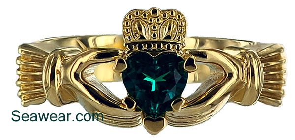 emerald Claddagh ring with heart shaped prongs
