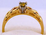 14kt Celtic engagement ring with .17ct VS yellow diamond