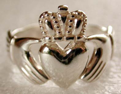 Made of a pair of hands holding a crowned heart, it symbolizes love (heart), 