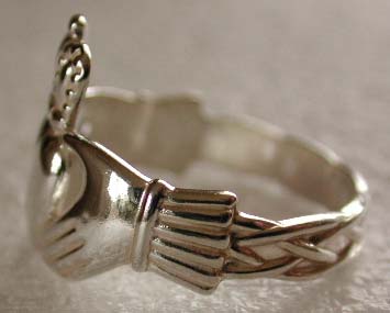 detail of claddagh cuff and celtic knots
