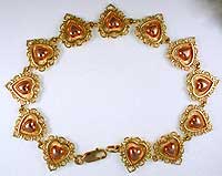 claddagh filigree hears bracelet in two tone gold