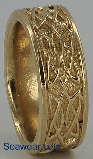 Celtic wedding band after porcelain tumbling