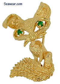 foxy fox with bushy tail brooch pin with emerald eyes