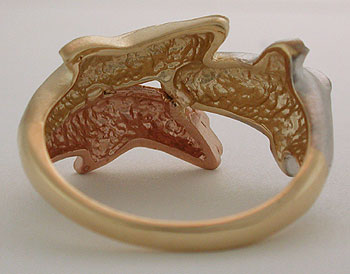 smooth shank and back side of tri gold dolphin ring