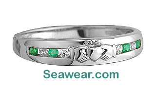 white gold Claddagh enternity band with emeraldsand diamonds