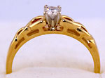 14k Celtic engagement ring with .15ct SI diamond