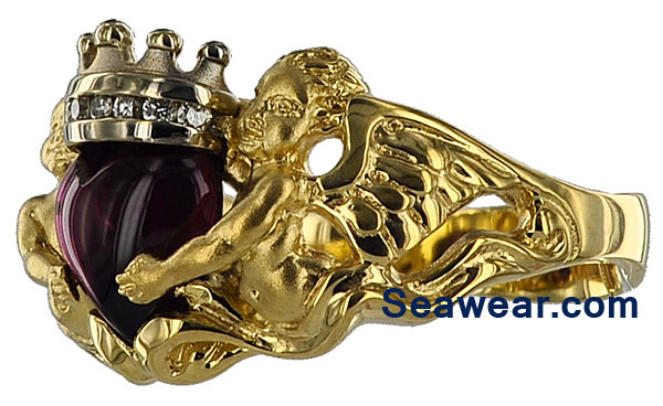 cherub claddagh ring with rhodolite and diamonds