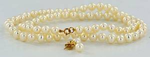 white pearl necklace and earrings with 14kt gold findings