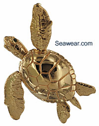14kt gree sea turtle with emerald eyes with all moving flippers, tail and head.