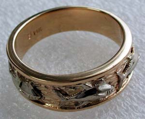 platinum and 18kt gold triple tuna ring